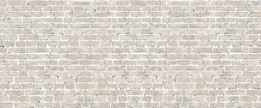 Beige brick wall seamless pattern.