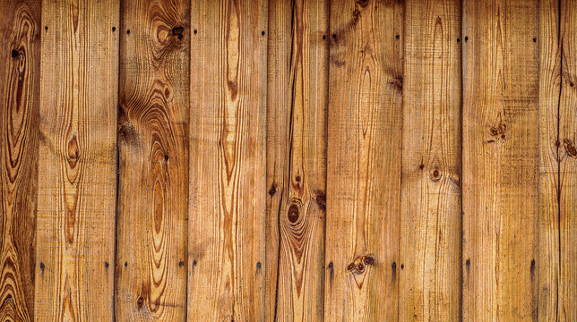 Oiled pine plank fence. Horizontal wood texture