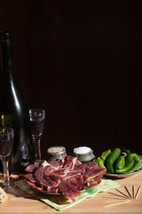 Wine with wineglass and different delicious