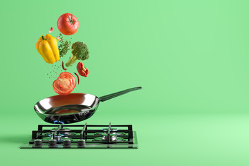 Fresh colored vegetables and glass lid are flying from the frying pan. At the bottom - a cooking...