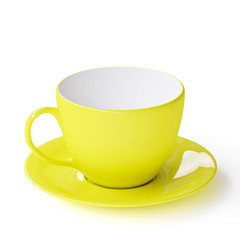 Empty yellow cup with saucer on white background. 3d image