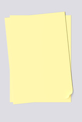 Blank sheets of yellow paper isolated on gray background. 3d image