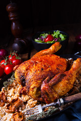 Grilled spicy chicken with barley groats and mushrooms