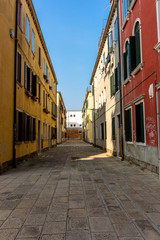 Fototapeta na wymiar Italy, Venice, typical street between the buildings