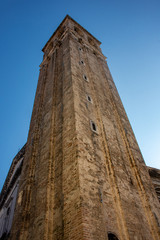Fototapeta na wymiar Italy, Venice, ancient tower in a town square.