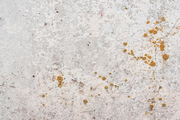 Wall fragment with scratches and cracks