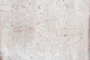 Fototapeta premium Wall fragment with scratches and cracks
