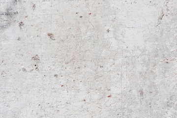 Wall fragment with scratches and cracks