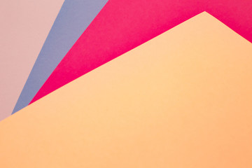 sheets of colored paper. Many colored sheets of paper are laid out in the harsh composition. background of colored paper.