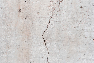Wall fragment with scratches and cracks