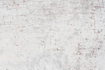 Wall fragment with scratches and cracks