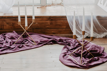 gold candlestick on the floor