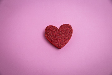 Obraz premium top view of a heart against pink background
