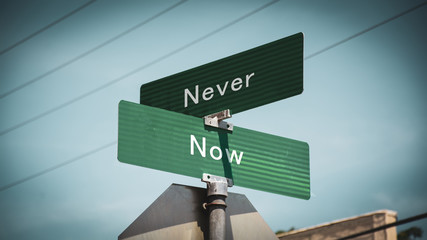 Street Sign Now versus Never