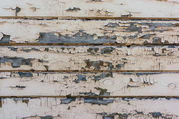 Old wall background with peeling paint