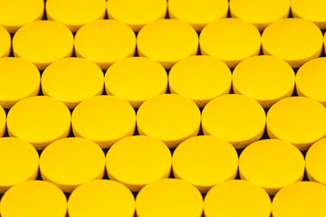 top view of yellow Pharmaceutical medicine pills