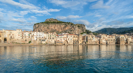 Fototapeta na wymiar Landscape with beach and medieval Cefalu town, Sicily island, Italy