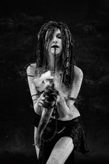 Portrait of a shaman holding a steaming horn