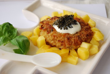 Black caviar served on a dish 