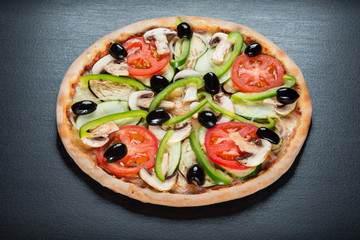 Pizza with tomatoes and olives
