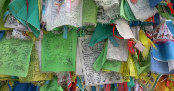 Colorful Tibetan prayer flags swaying in the wind in the temple, Ulan Ude Russia