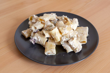 Tuna salad on wooden table