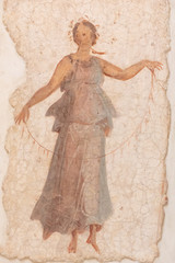 Ancient roman fresco showing a woman in a salmon dress