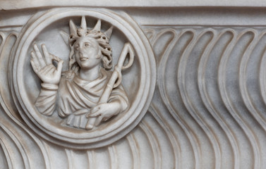 Crowned woman engraved on marble stone