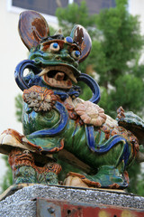 on the roof of a buddhist temple in can tho (vietnam) 