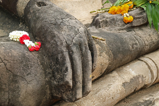 Beautiful Flower Garlands on Buddha Image's Lap and Hand, Wat Mahathat Temple, Ayutthaya, hailand