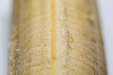Peeled banana extreme macro background