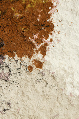 Abstract colorful powder background, close up view of mixed powders, design element