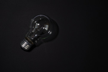 light bulb on black background