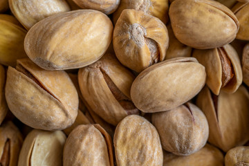 Fresh pistachio background. Nuts. Green fresh pistachios as texture.