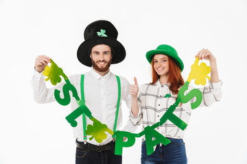 Happy young couple wearing costumes, celebrating