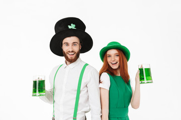 Happy young couple wearing costumes, celebrating