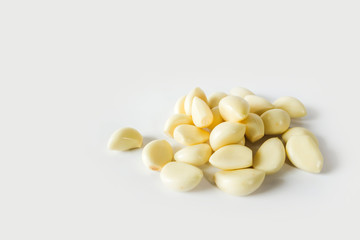 Garlic cloves on the white color background