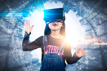 The abstract double exposure image of the girl using smart glasses or VR glasses overlay with virtual hologram image. the concept of communication, internet of things and future life.