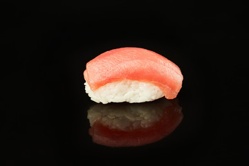 Classical sushi tuna on black background for menu. Japanese food