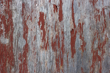 old brown wooden surface with cracks and stains
