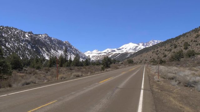 Scenic road through the mountains of Sierra Nevada - travel photography