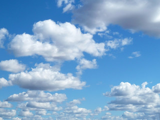 Blue sky with white clouds. Beautiful sky background. Clear day and good weather.              