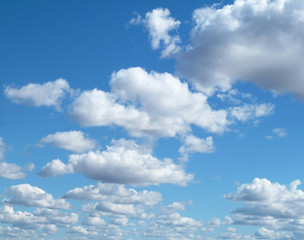 Blue sky with white clouds. Beautiful sky background. Clear day and good weather.              