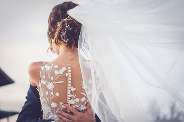 bride and groom wedding hug