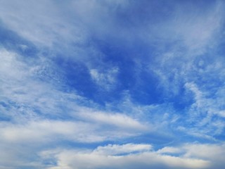 Naklejka na ściany i meble blue sky with white, soft clouds.The sky is clear.