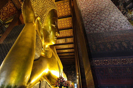 The image of Reclining Buddha in the chapel of Wat Pho, Bangkok, Thailand ( Rattanakosin Island).
