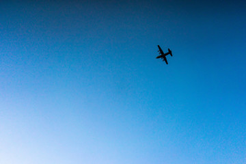 military plane over the island of crete