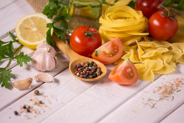 Healthy food, tomatoes and spaghetti lines.