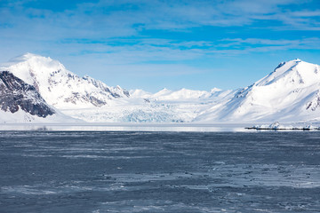 Fototapeta na wymiar Icy seascapes of Arctic Ocean.