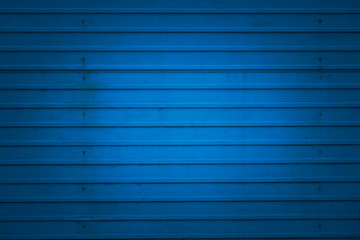 background with blue metallic striped fragment of the facade of a building